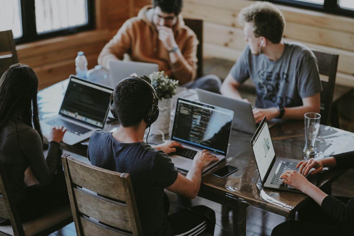 People collaborating around a table; illustrative photograph